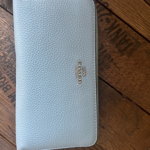 Coach Handbags - Coach Light Blue Pebbled Leather Zip-Around Wallet with Silver Logo